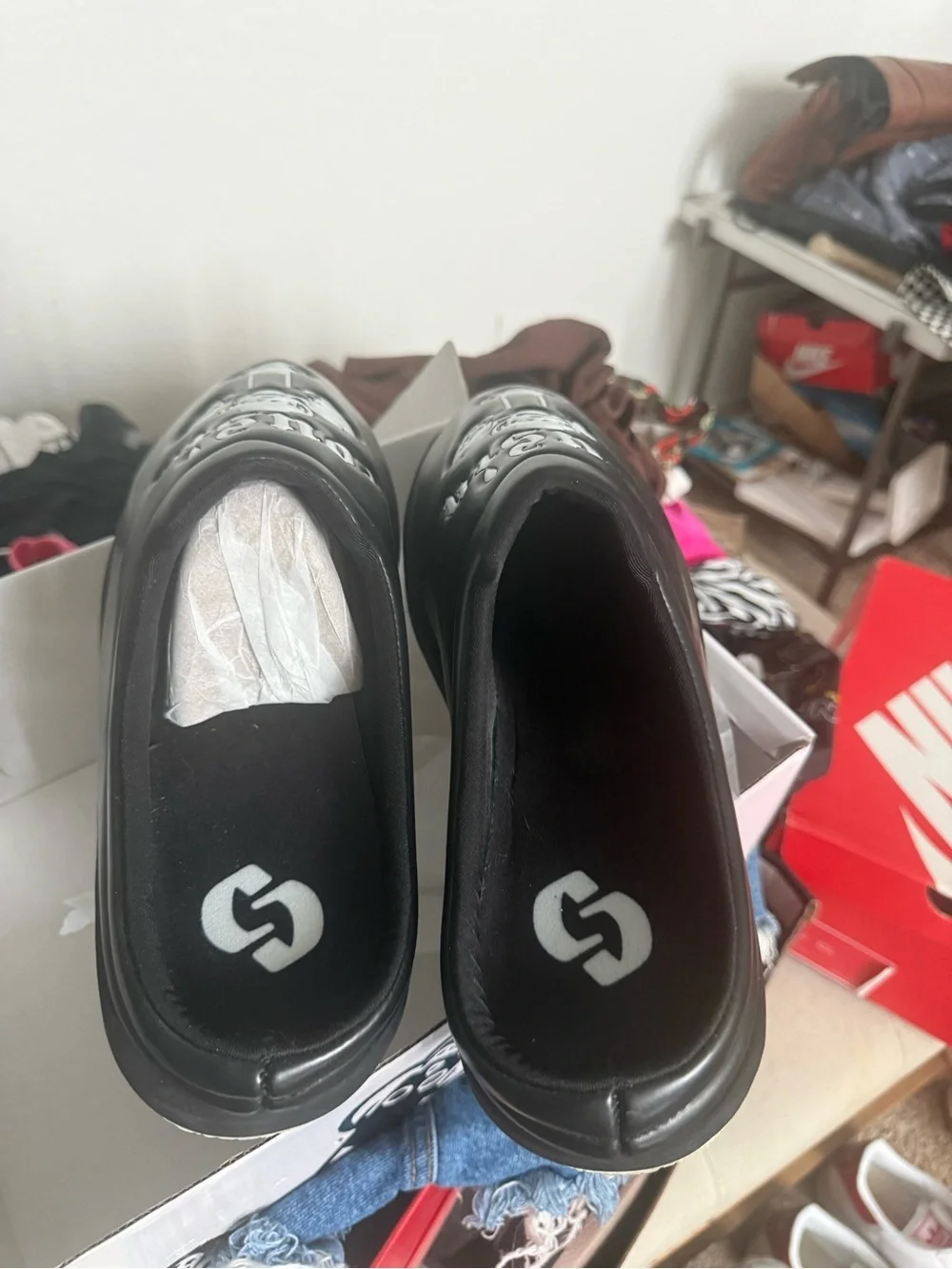 Cousin’s custom Black Slip-On Graphic Clog Shoes with Skull Design